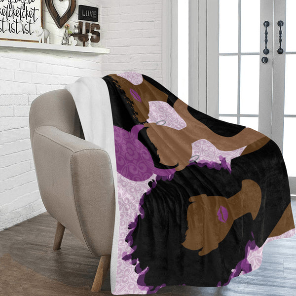 Wrapped in purple blanket. Mygani